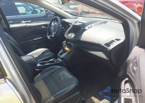 2013 Ford Escape Titanium z USA, uszkodzony, nr VIN 1FMCU9J94DUD89271